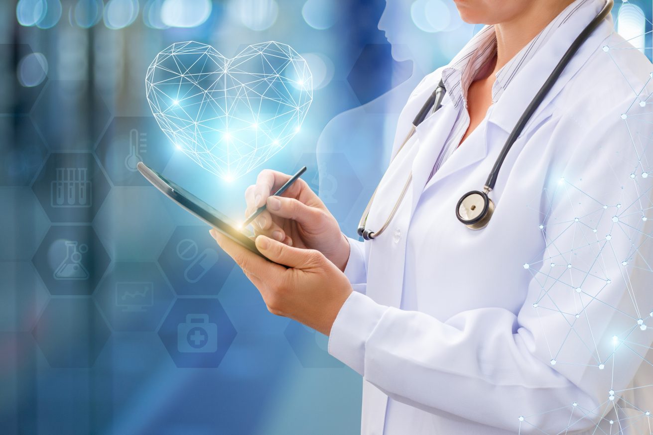 Doctor works on your computer . Doctor works on your computer on blurred background.